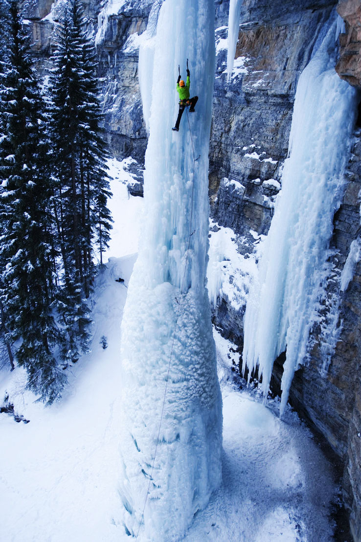 Ice climbing a frozen waterfall