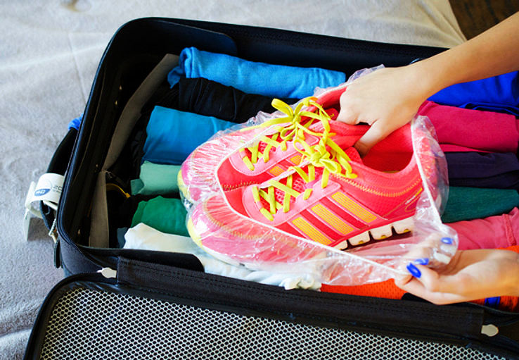 When packing, wrap your shoes in a shower cap