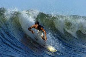 Surfing: Racing The Waves