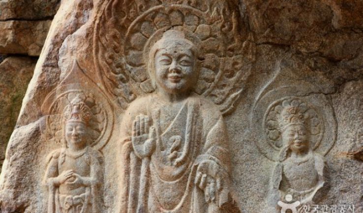 Rock carved triad Buddha Trip Packages