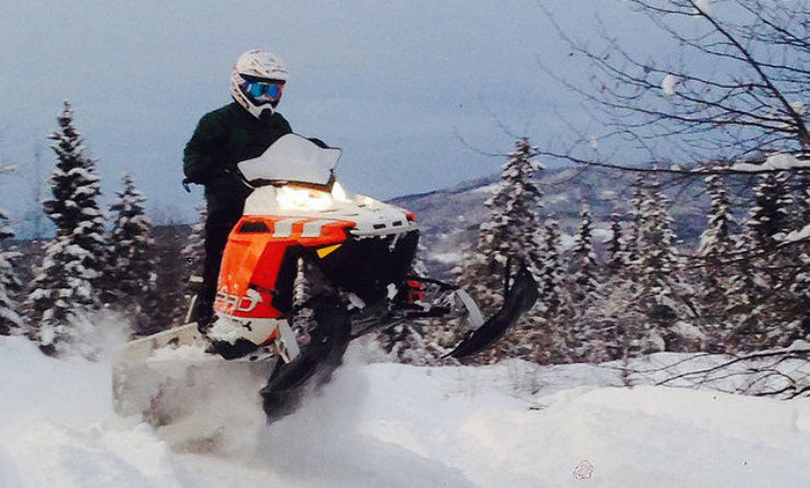 Snowmobile Terrain for snowmobiling Trip Packages