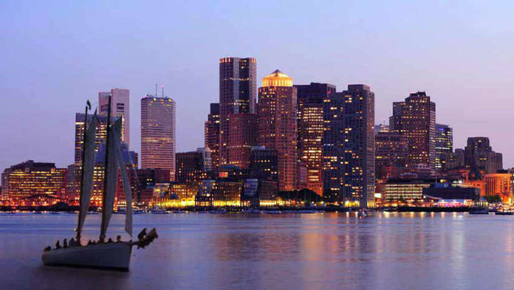 City lights twinkle from Riverfront Park  Trip Packages